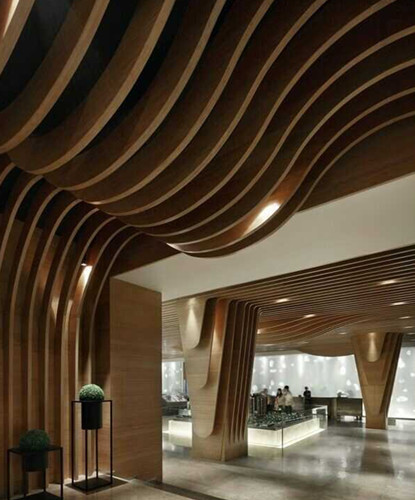 发廊弧形鋁方通吊頂-波浪形木紋鋁方通幕墙